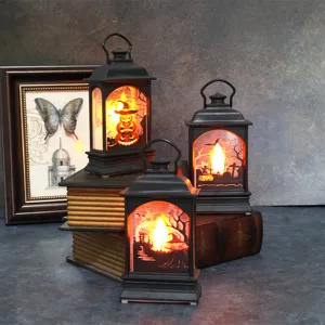 Lanterne LED di Halloween con sagome luminose di zucche e castelli spaventosi