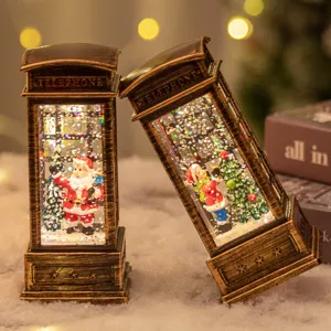 Linterna de bola de nieve de cabina telefónica vintage navideña con Papá Noel y luz de purpurina.
