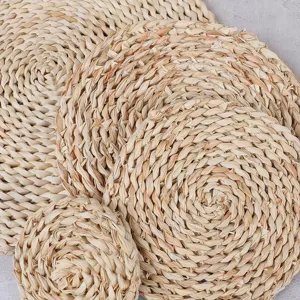 Tovaglietta intrecciata in paglia naturale rotondo tappetino isolante termico per cucina.