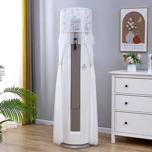 Vertical cylindrical air conditioner dust cover with white lace embroidery and tassels.