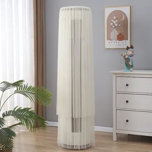Detail view of the vertical round air conditioner dust cover made of breathable mesh fabric.