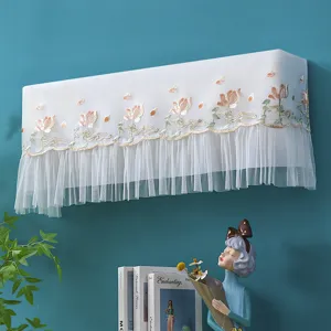 Wall-mounted AC dust cover with embroidered floral sheer mesh design, elegant home decor.