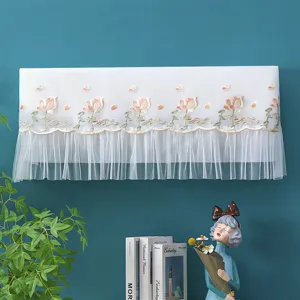 Elegant lace embroidered wall-mounted air conditioner dust cover with breathable sheer fringe.