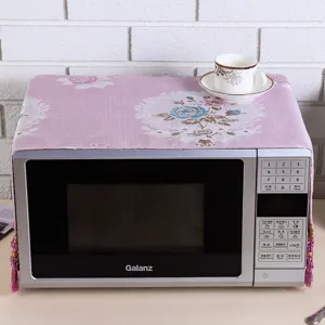 Floral microwave oven dust cover fabric protector with elegant pink floral pattern design details.