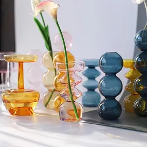 Artistic colored glass bubble vase detail showing transparent design for aesthetic home decor.