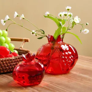 Ensemble de vases grenade en verre rouge créatif pour arrangement floral hydroponique et décoration.