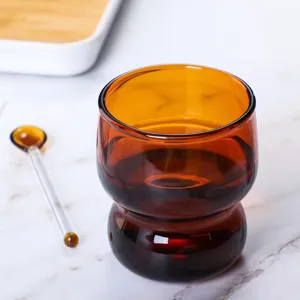Tasse en verre ambré créative avec cuillère assortie pour café, lait et thé au quotidien.