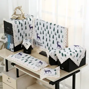 Detailaufnahme des Computer-Staubschutzhüllen-Sets aus Baumwolle mit Baummotiv.