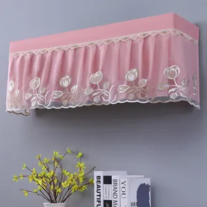 Detail of pink lace hanging air conditioner dust cover with floral embroidery, stylish home decor.