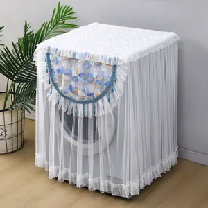 Cubierta antipolvo para lavadora de encaje blanco con elegante bordado floral azul y abalorios.