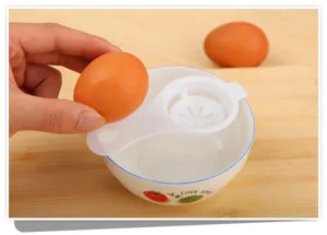 Plastic egg separator white kitchen tool for separating egg yolk and white easily in bowl use