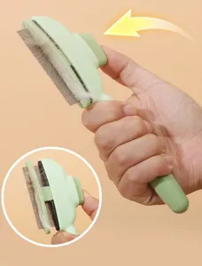 Green pet slicker brush for cats and dogs, easy hair removal comb with push button.