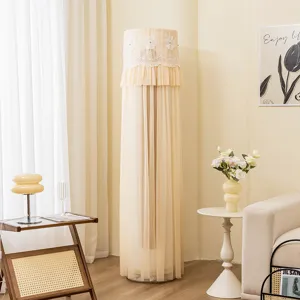 Fundas para aire acondicionado cilíndrico vertical beige con elegante bordado de encaje.