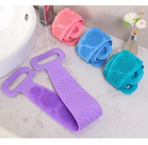 Lengthened silicone bath scrubber with double-sided bristles and handles for easy back exfoliating.