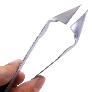 Stainless steel pineapple eye remover tool, practical V-shaped fruit seed clip for kitchen.