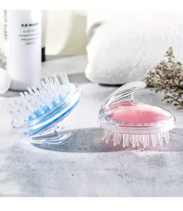 Silicone scalp massage brush for hair washing, shampoo brush with soft bristles and handle.