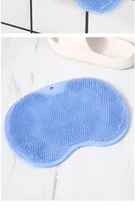 Silicone foot scrubber massage mat detail view, anti-slip bathroom shower floor pad.