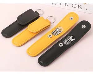 Portable ear pick set with stainless steel tools and leather keychain case for daily care.