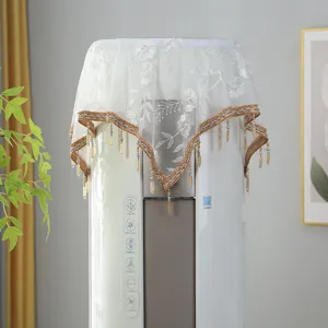 Fundas antipolvo para aire acondicionado vertical de encaje blanco con borlas doradas.