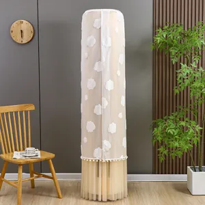 Detail view of the cylindrical vertical air conditioner cover featuring cute white clouds and tassel.