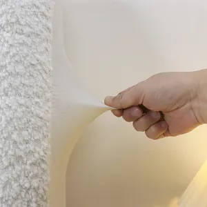 Detail shot of stretchy headboard cover fabric, showing high elasticity and soft texture.