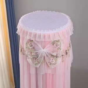 Pink lace embroidery air conditioner cover detail, delicate bow design and sweet home decor style.