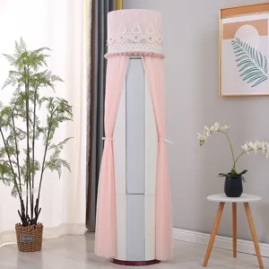 Copertura antipolvere rosa per condizionatore verticale con design in pizzo per unità cilindriche.