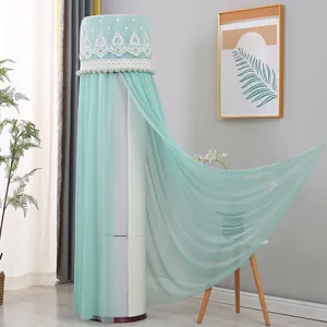 Copertura antipolvere per condizionatore verticale verde chiaro pizzo mesh dettaglio decoro.