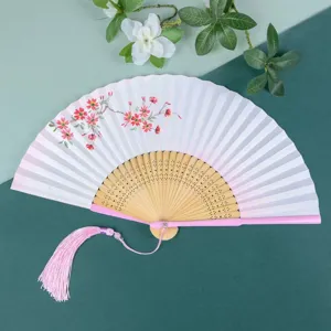 Beautiful folding paper fan with bamboo ribs and pink tassel, perfect for summer daily use.