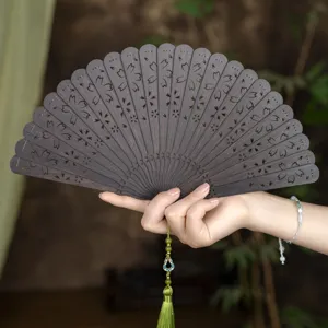 Vintage Sandalwood Folding Fan Carved Hollow Ancient Style Dance Hand Fan With Tassel Portable Summer Fan