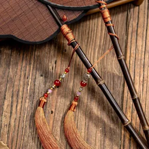 Traditional Chinese style bamboo fan with delicate tassels and beads, antique handicraft main photo