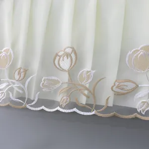 Exquisite floral embroidery detail of the wall-mounted air conditioner dust cover fabric.