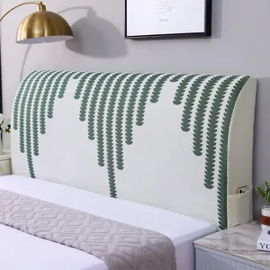 Fodera per testata letto in ciniglia elastica antipolvere con tasca portaoggetti laterale.
