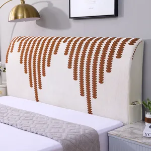 Copritesta in ciniglia fodera per testata letto elastica con tasca laterale portaoggetti.
