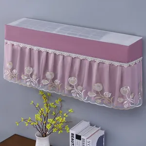 Detailed view of a stylish pink lace embroidered wall-mounted air conditioner dust cover.