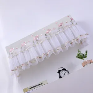 Elegante geborduurde kanten airconditioning stofdhoes voor wandmontage in huis comfort.