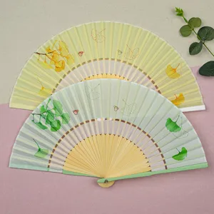 Éventail pliable chinois élégant avec motif de feuilles de ginkgo pour la danse et l'été.