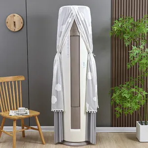 Cylindrical vertical air conditioner dust cover detail showing white lace mesh with cloud pattern.