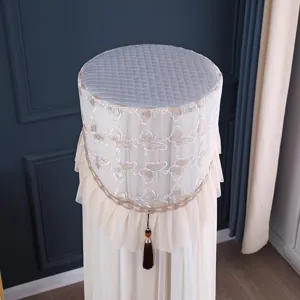 Elegante copertura per condizionatore verticale in pizzo antipolvere per unità rotonde.