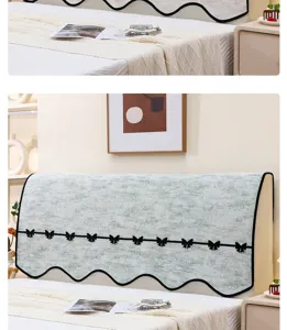 Detalle de funda para cabecera de cama de chenilla, tela suave borde festoneado lazos negros.