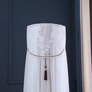 Copertura per condizionatore verticale in pizzo bianco cilindro protezione ac con nappa.