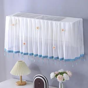 Housse de climatiseur en dentelle blanche rideau de gaze anti-poussiere avec pompon bleu.