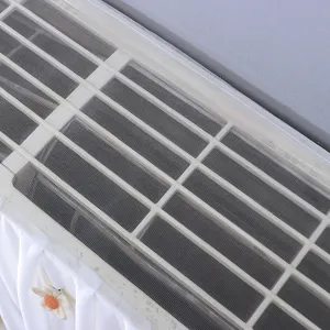 Gros plan détaillé de la housse de protection en filet respirant pour climatiseur.