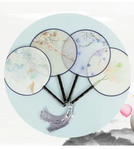 Traditional Chinese silk round fan with wooden handle floral art detail for photography and Hanfu