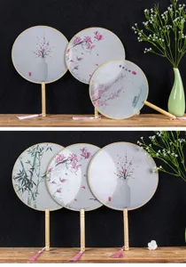 Traditional Chinese style round silk fan with wooden handle for photography and hanfu matching.