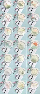 Detailed view of translucent Chinese traditional round fans with wooden handles and delicate tassels.