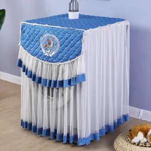 Fundas antipolvo acolchadas de encaje azul para lavadora con detalle de bordado de ciervo.