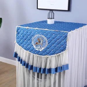 Fundas antipolvo acolchadas azules de encaje para lavadora con patrón de ciervo bordado.