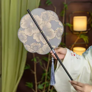 Traditional Chinese Hanfu round fan with exquisite floral embroidery and elegant tassel pendant.