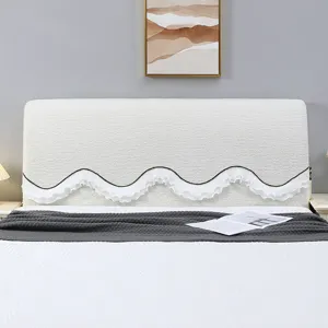 White plush headboard cover with wavy ruffle trim, soft protective dustproof slipcover for bed.